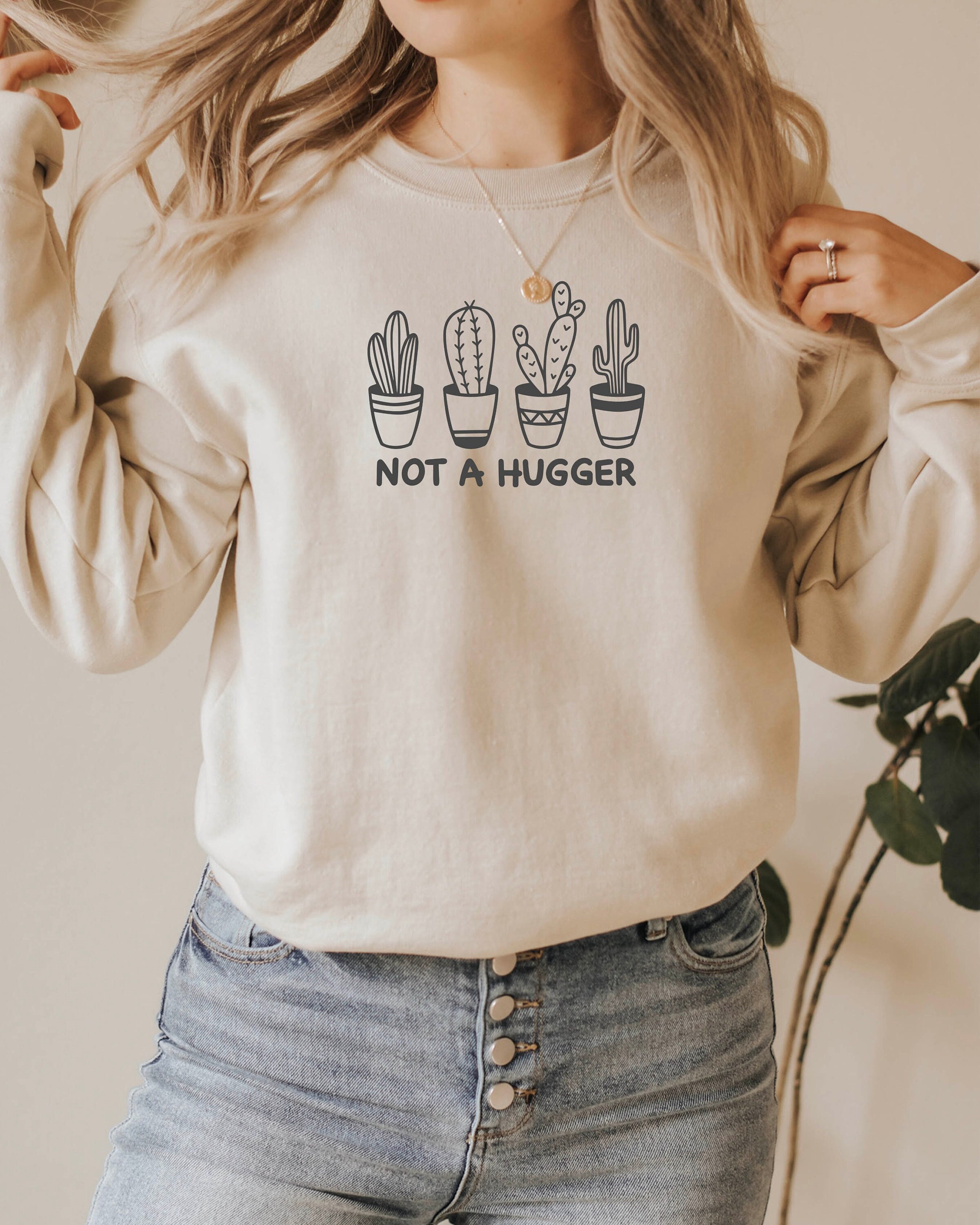 Not a hugger sweatshirt sale