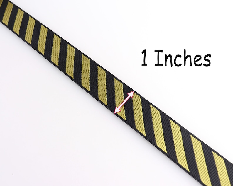 May include: Black and gold striped ribbon with a measurement of 1 inch.