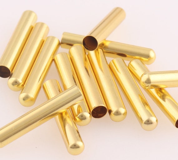 Gold shoelace tips outlet
