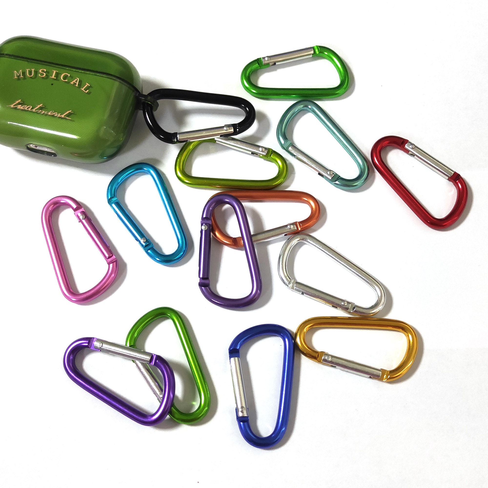 Carabiner key chain attaches to your bag or briefcase. Spring-hinge allows  easy release of the clip and quick access to keys. Carabiner key chain  mimics the look of the climber clip but