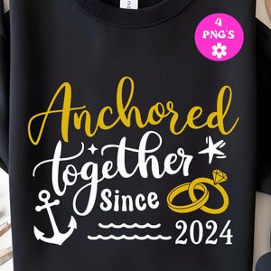 May include: Black sweatshirt with the words "Anchored together since 2024" in gold and white script. The design includes an anchor, rings, and a star. A pink circle with "4 PNG's" is in the upper right corner.