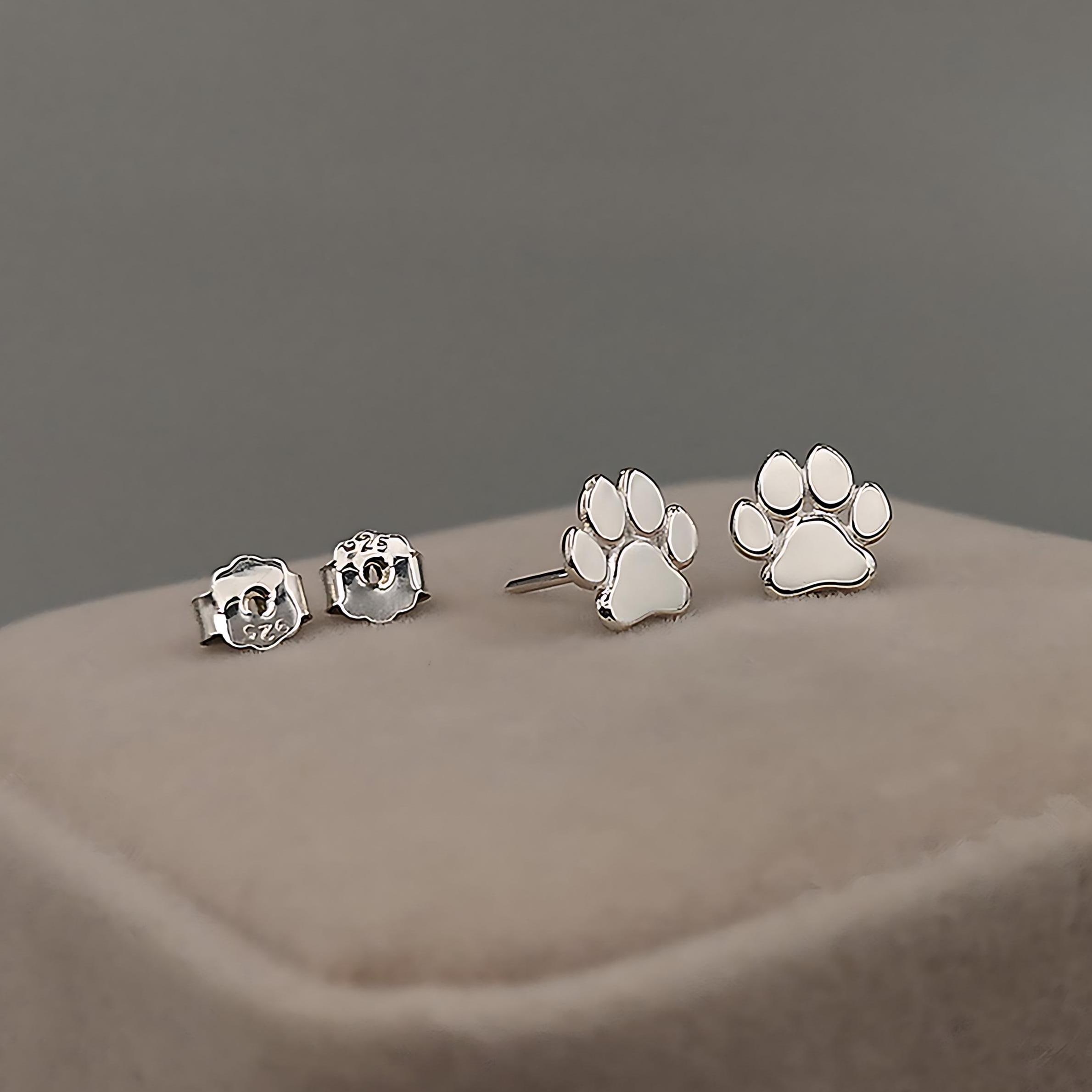 Ciondolo zampa semizirconata bianca placcato oro bianco in argento 925