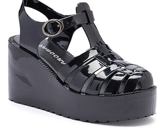 black jelly flip flops