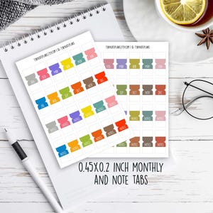 May include: Two sheets of colorful planner stickers with monthly and note tabs. The tabs are in various colors, including blue, orange, and pink. The text "0.45x0.2 inch monthly and note tabs" is printed on the image. A white pen and a spiral notebook are also visible.