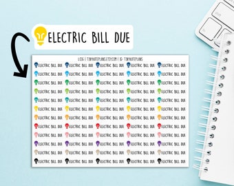 May include: A sheet of colorful stickers with the text "ELECTRIC BILL DUE" and a lightbulb icon. The stickers are arranged in rows and columns, with each sticker featuring a different color lightbulb.