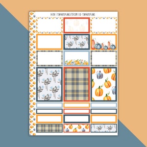 May include: A printable sheet of 12 fall-themed planner stickers with various designs, including pumpkins, plaid, and floral patterns. The stickers are in shades of orange, blue, and gray.