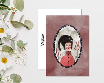May include: A postcard featuring an illustration of a person with a black cat on their head. The person is wearing a red coat and a striped turtleneck. The illustration is set in an oval frame with a blue border, against a mauve background.