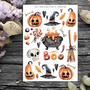 May include: A sheet of Halloween themed stickers featuring pumpkins, a witch's hat, a cauldron, a skull, a broom, candy corn, a lollipop, and the word "BOO!" in red, orange, and yellow letters.