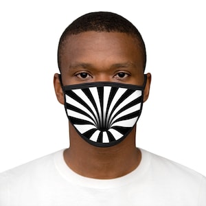 May include: A black and white face mask with a swirling, hypnotic pattern that creates the illusion of a tunnel. The pattern is made up of alternating black and white stripes.