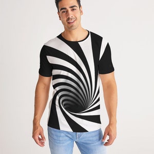 May include: A black and white t-shirt with a swirling, optical illusion design. The design resembles a black hole or a vortex.