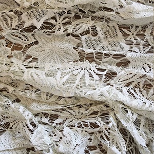 Off white Chantilly lace fabric,  off white  Chantilly lace fabric by the yard. Ivory Chantilly lace fabric