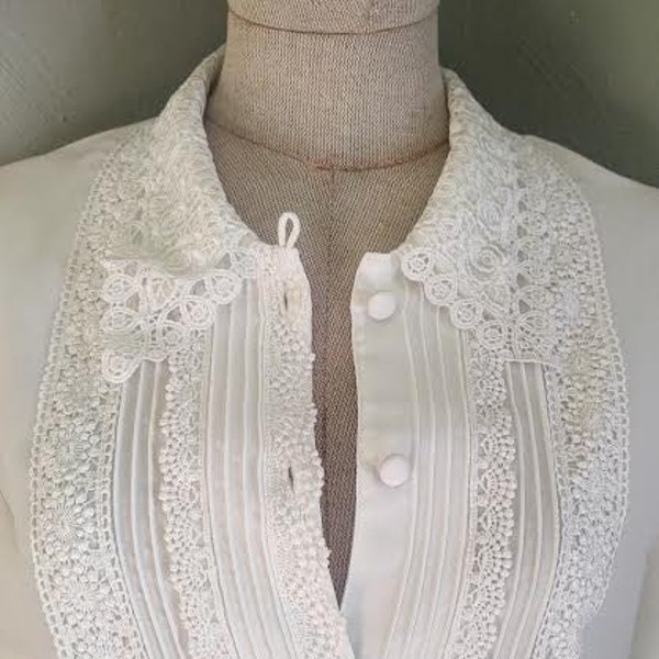 Crochet collared white blouse with pleats and covered buttons