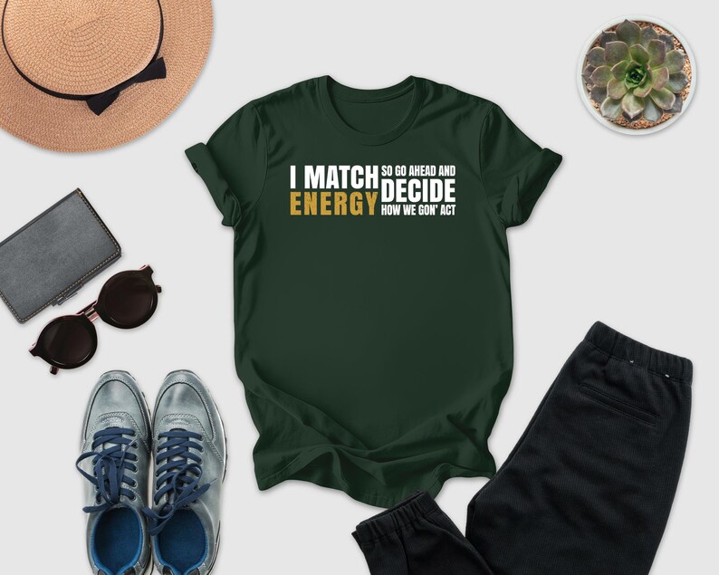 a green t-shirt with a humorous text, a pair of sunglasses, a hat, a wallet, a pair of sneakers, and a potted plant.