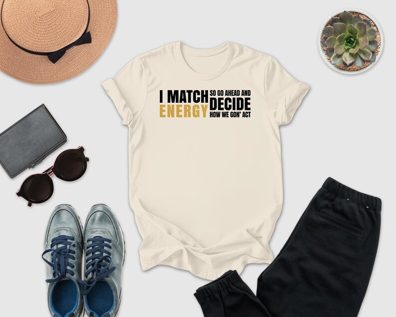a casual outfit consisting of a white t-shirt with text, sunglasses, a hat, a wallet, a pair of shoes, and a potted plant.