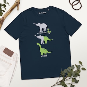 May include: A navy blue t-shirt with a humorous graphic comparing code written by friends to code written by the wearer. The graphic features an elephant, a snake, and a dinosaur. The text on the shirt reads "My friends code", "Me", and "My code".