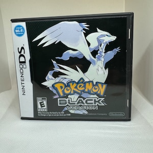 May include: A black Nintendo DS game case for Pokemon Black Version. The case features a white Pokemon with blue eyes and a black background. The ESRB rating is E for Everyone. The game is rated E for Everyone by the ESRB.