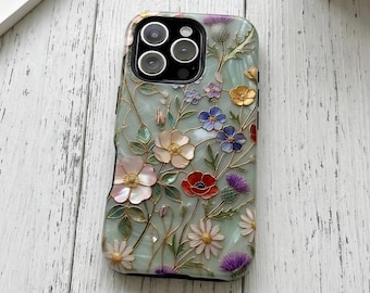 May include: A phone case with a pale green, pearlescent background featuring a raised, multi-colored floral design. The pattern includes various flowers in shades of pink, red, blue, yellow, and purple, with thin gold-toned stems and leaves.