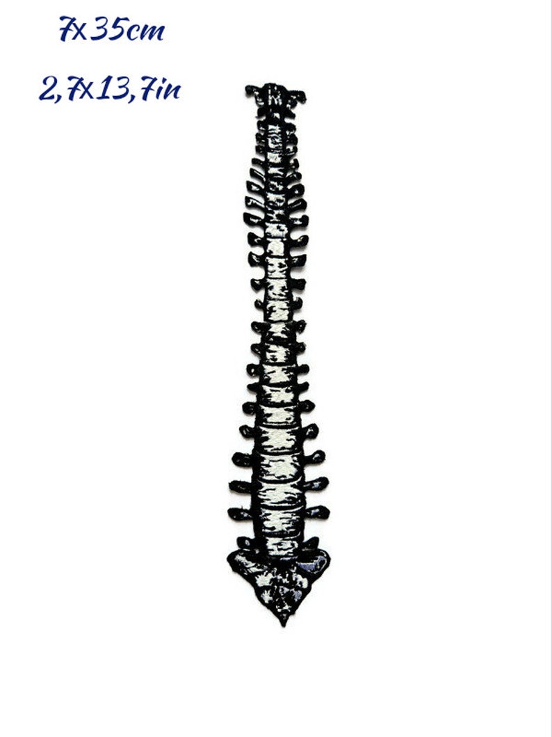 May include: A black and white spine-shaped patch, measuring 7 x 35 cm (2.7 x 13.7 inches). The patch features detailed vertebrae and is set against a white background. The dimensions are displayed in both centimeters and inches.