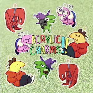 Puede incluir: Amuletos acr&iacute;licos con personajes de dibujos animados en varias poses y colores. Los amuletos incluyen una figura roja, una figura verde con una pistola y una figura amarilla con una sudadera roja. Tambi&eacute;n se muestra el texto "ACRYLIC CHARMS!"