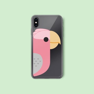 May include: A clear phone case with a pink and gray parrot design. The parrot's head is partially visible on the left side of the case.