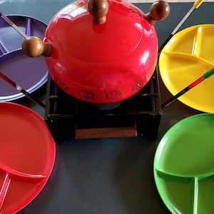 Juego de fondue vintage de los años 70, nunca usado, en su caja original.
