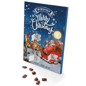 May include: A blue and white Christmas advent calendar with a Santa Claus and reindeer illustration. The calendar has 24 doors, each with a number. The text "We wish you a Merry Christmas" is printed on the calendar. The calendar is on a white surface with chocolate candies scattered around it.