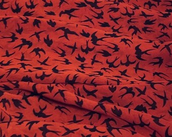 Tessuto chiffon con stampa di uccelli neri arancioni bruciati 58'' PREZZO AL METRO