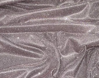 Babyrosa glitterlurextyg 137 cm PRIS PER METER