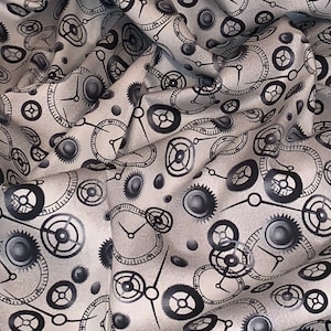 May include: A white fabric with a repeating pattern of black and gray clock gears and hands.
