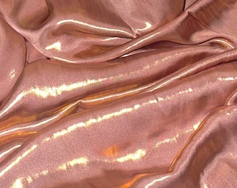 Dammigt rosa guld skimrande satintyg 137 cm PRIS PER METER