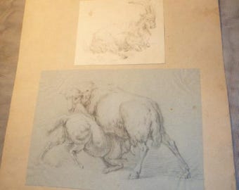 May include: A black and white drawing of two sheep, one standing and the other lying down. The drawing is on a light blue background and is framed in a white mat. The text "J.L. de  /  Dessin  /  à  /  Munster  /  1814" is written in the bottom left corner.