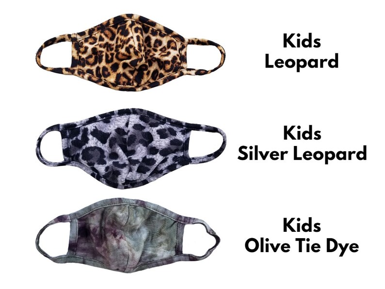 May include: Three kids' face masks. The first mask is leopard print. The second mask is silver leopard print. The third mask is olive tie dye. The text on the image reads "Kids Leopard", "Kids Silver Leopard", and "Kids Olive Tie Dye".