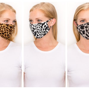 LEOPARDMÖNSTER Tvättbar ansiktsmask i stretchig bomull med foder, dubbelt lager och filterficka, bra passform, snabb leverans, presenterad på GQ.com bild 1