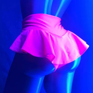 Rave outfits UV reactive neon pink shorts or fish net tights neon orange fishnet stockings fishnet hosedance