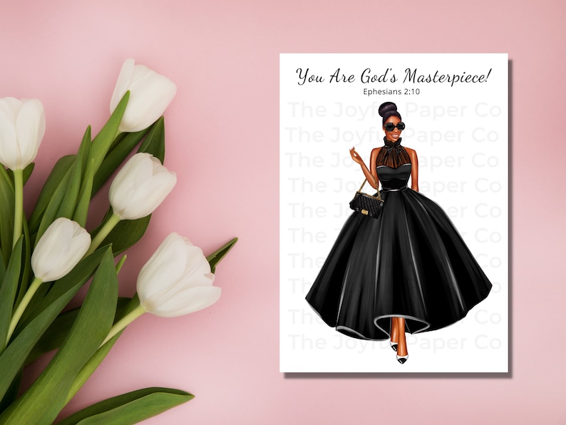 May include: A digital illustration of a Black woman wearing a black gown and sunglasses. The text "You Are God's Masterpiece! Ephesians 2:10" is printed on the white background.