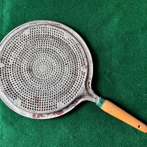 JPAX.  Heat Diffuser  buffer between bottom of pan & heat surface
