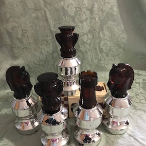 GA—Avon (five) Chess Pieces Assorted