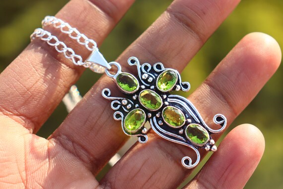 Peridot cross pendant outlet