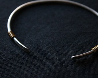 Lidia Bangle || German silver band • Brass detailing