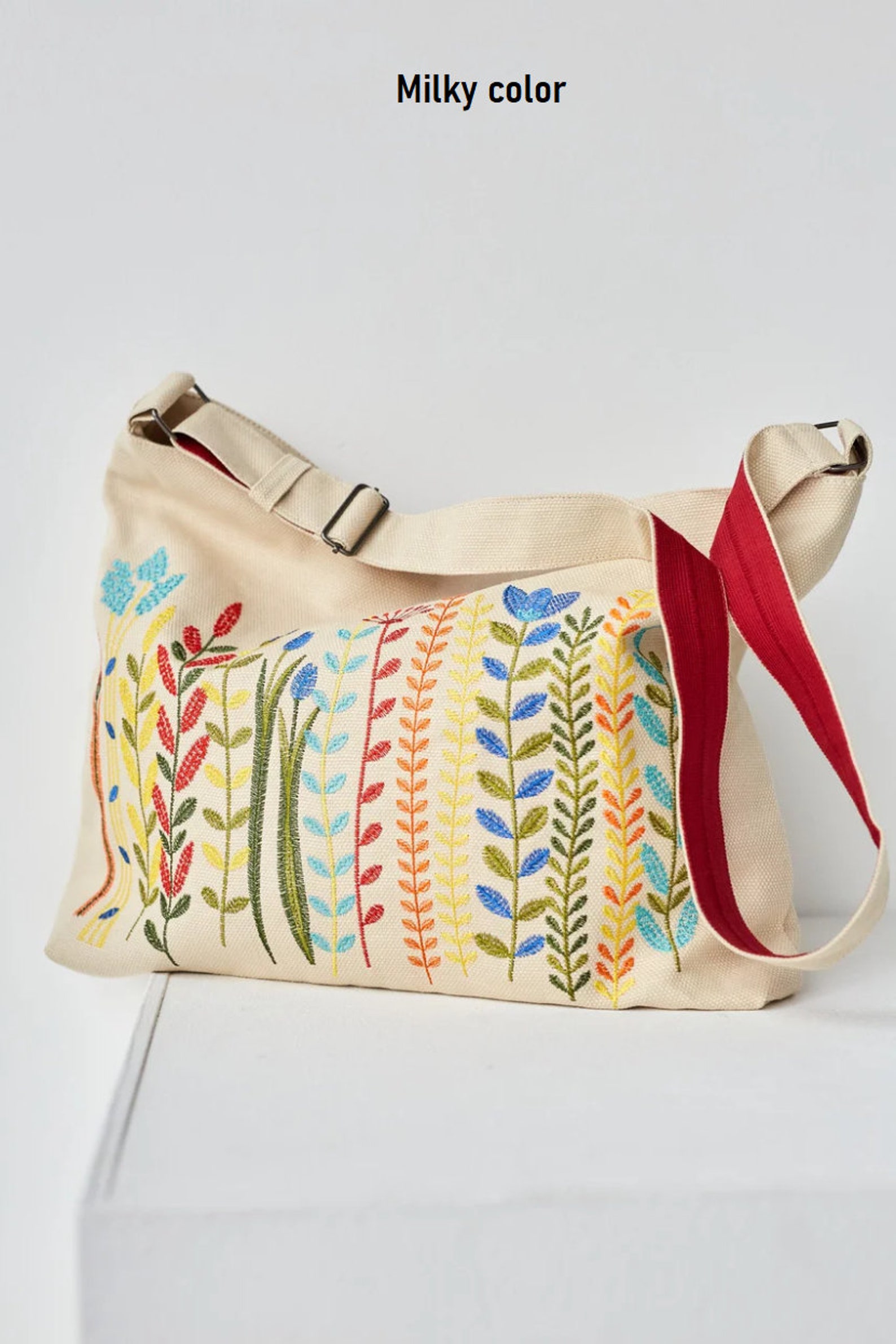 Embossed Flowers Messenger Bag
