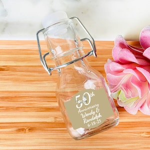 Personalized 12 Pieces Golden 50th Wedding Anniversary Mini Glass Favor Bottle with Swing Top, Anniversary Party Favors (MG833)