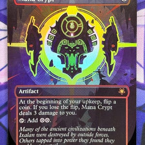 May include: A Magic: The Gathering card titled "Mana Crypt." The card features a circular, neon green and yellow design with a central symbol. Text includes "Artifact" and game instructions. The card has a black border and a holographic finish.