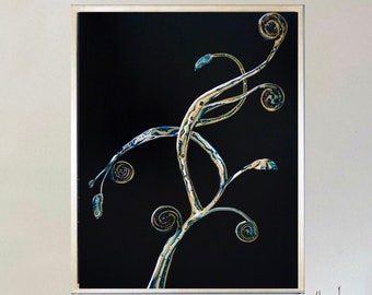 May include: A framed black and white print of a stylized plant with gold and blue accents. The print is hanging on a white wall with a tall vase and a smaller vase on a wooden floor.