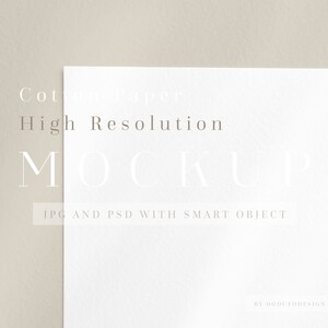 May include: A white cotton paper mockup with the text "Cotton Paper High Resolution MOCKUP JPG AND PSD WITH SMART OBJECT BY DODUTODESIGN ON ETSY".