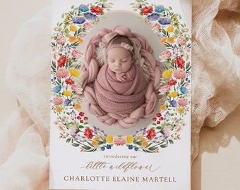 May include: A baby announcement card with a floral wreath surrounding a photo of a sleeping baby. The text reads "introducing our little wildflower CHARLOTTE ELAINE MARTELL".