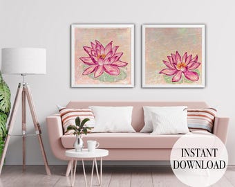 May include: Two framed watercolor paintings of pink lotus flowers on a light green lily pad. The artwork is displayed above a pink sofa with white pillows and striped throw pillows. A floor lamp and small side table are also in the room. The text "INSTANT DOWNLOAD" is in a circle.