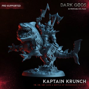 May include: A gray 3D printed miniature of a goblin riding a mechanical shark. The goblin is holding a large axe and wearing a pirate hat. The miniature is pre-supported and ready to be printed. The text "Kaptain Krunch" and "Yo, Ho, Ho! (And a bottle of murderous intent)" is printed below the miniature.