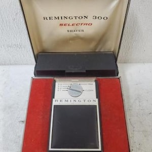Afeitadora eléctrica personal Remington Selectro 300 vintage con estuche de transporte