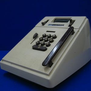 Calculadora sumadora Victor 7 82 54 antigua