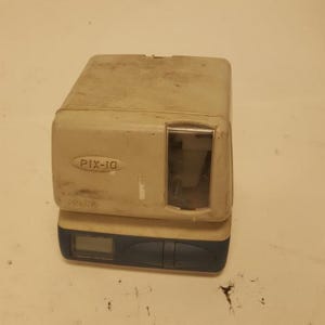 Vintage Aman PIX-10 prikklok voor medewerkers